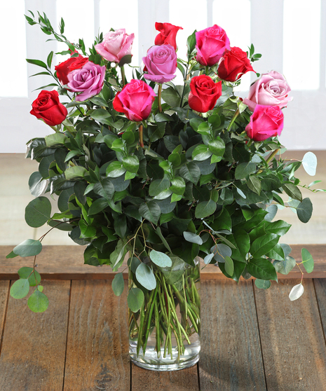 Farm-fresh luxury 'Love & Romance' Ecuadorian Mountain Roses featuring our 30% Larger Red, Pink, and Hot Pink Colors in a chic vase.