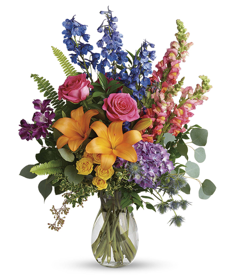 Colors of the Rainbow features garden hydrangea, lilies, roses, in vibrant, rich colors