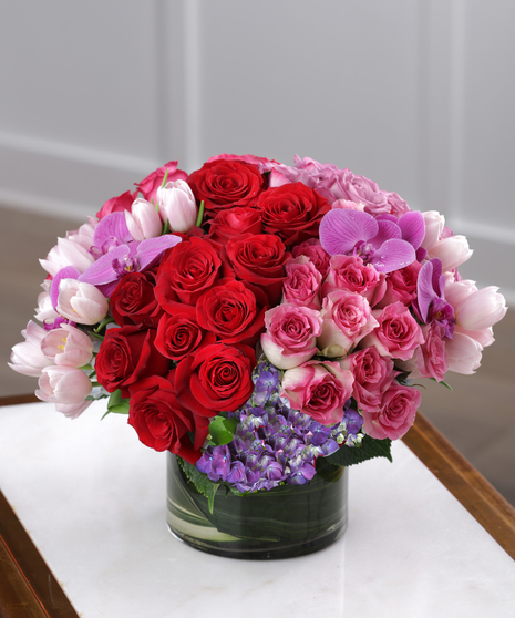 My One and Only arrangement features 4 romantic colors of Ecuadorian Mountain roses and orchids nestled in hydrangea and tulips.