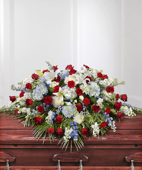 American Patriot Casket Cover featuring red, white, & blue flowers