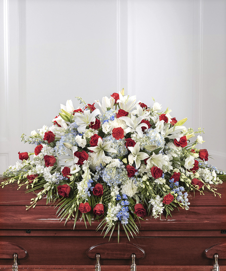 American Patriot Casket Cover featuring red, white, & blue flowers