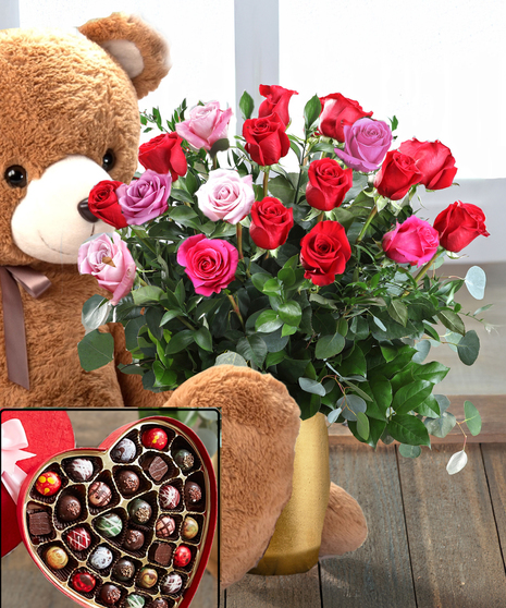 Hugs and Kisses Valentine Packages featuring roses, chocolates and a huggable over-sized 3 foot teddy bear.