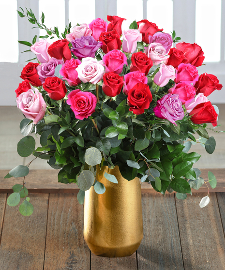 Farm-fresh luxury 'Love & Romance' Ecuadorian Mountain Roses featuring our 30% Larger Red, Pink, and Hot Pink Colors in a chic vase.